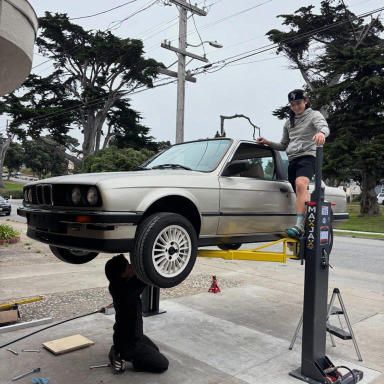 This disappearing driveway lift setup is a next-level home mechanic move