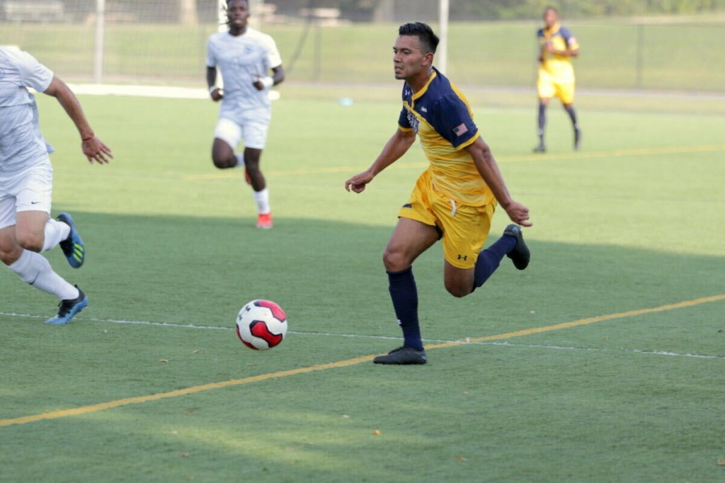 Viral video shows Long Island cop school kids in soccer while wearing ...