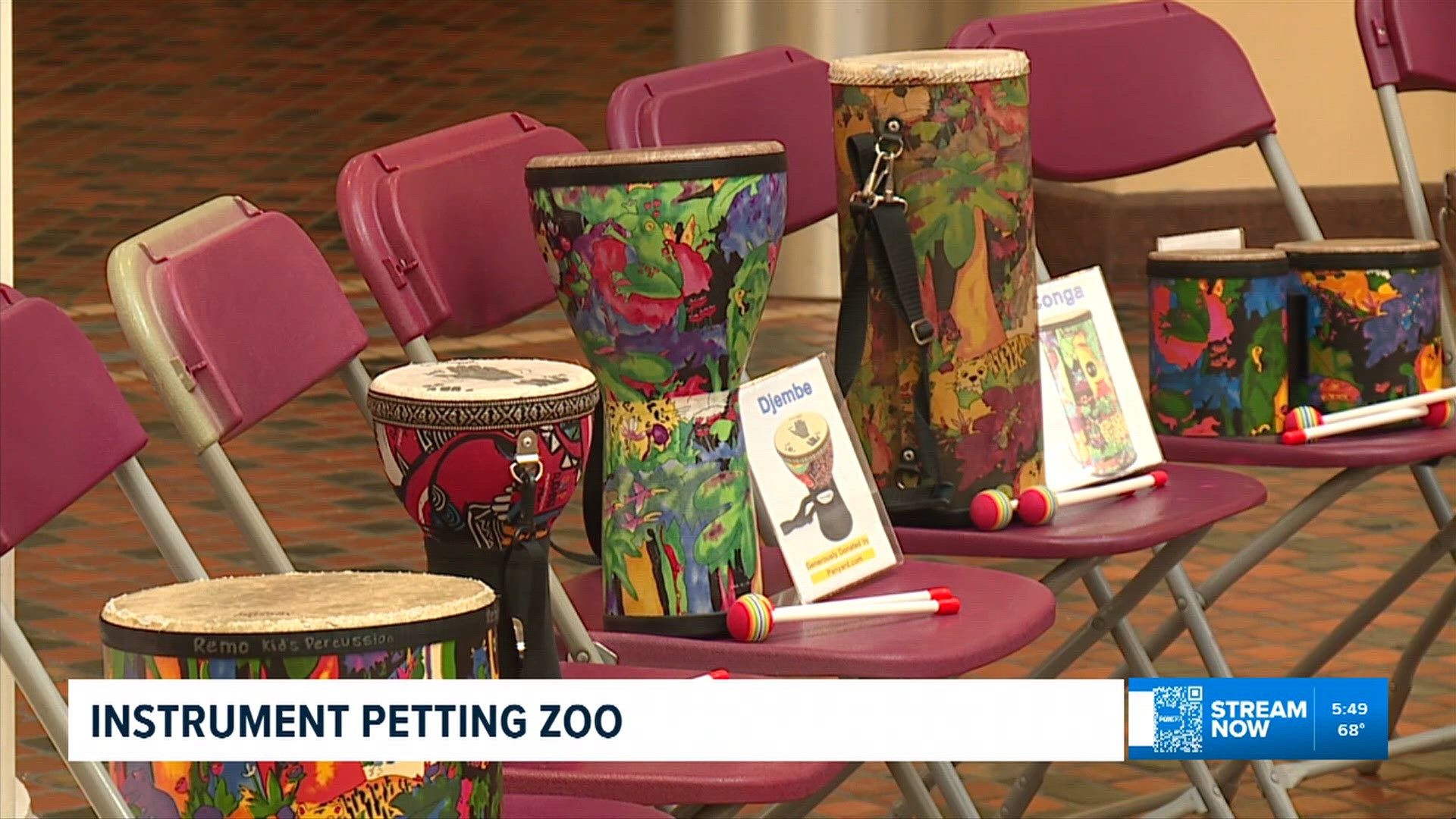 Instrument petting zoo held at State Capitol for Kids Music Day