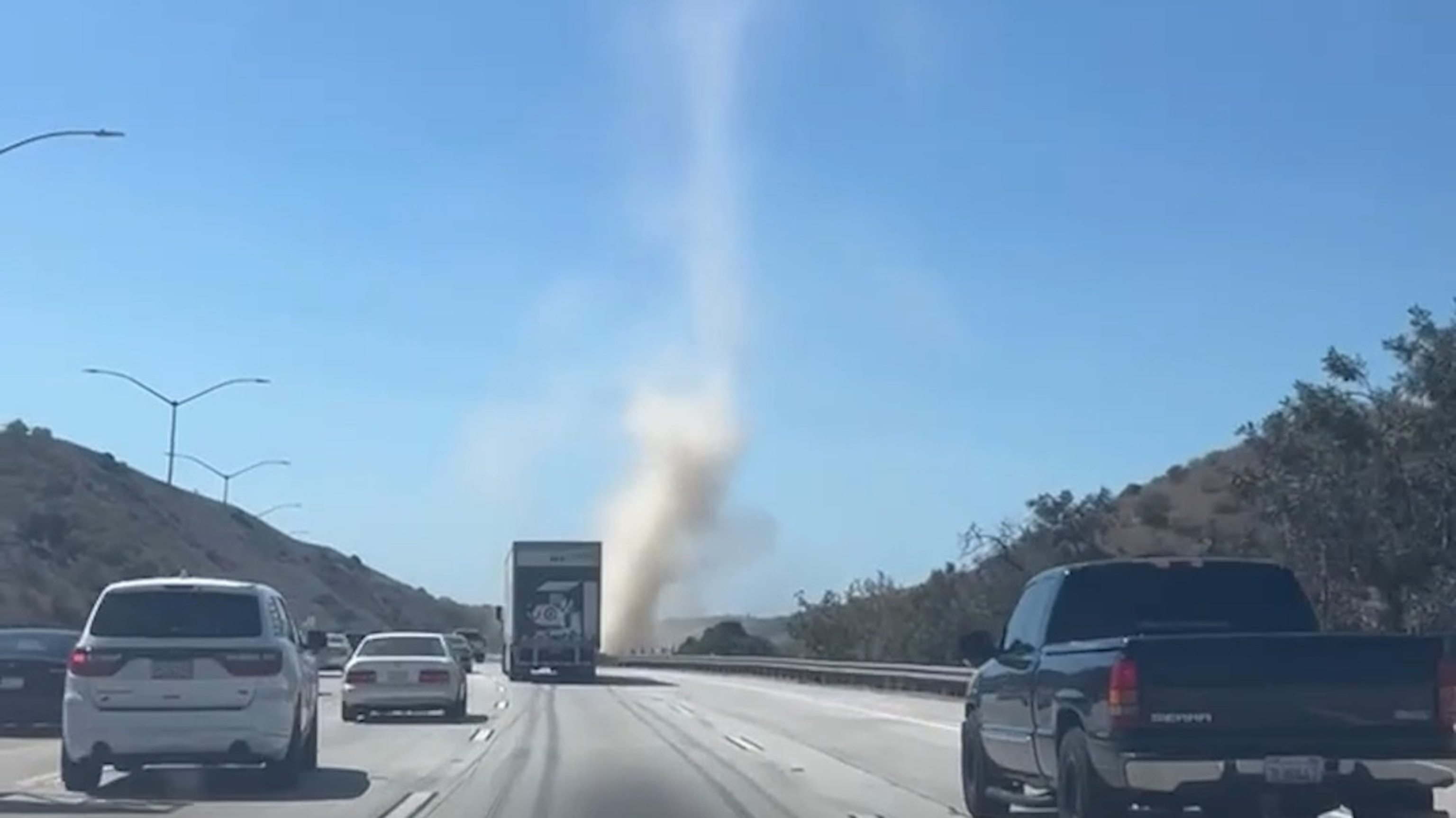 Dust devil swirls beside a California highway