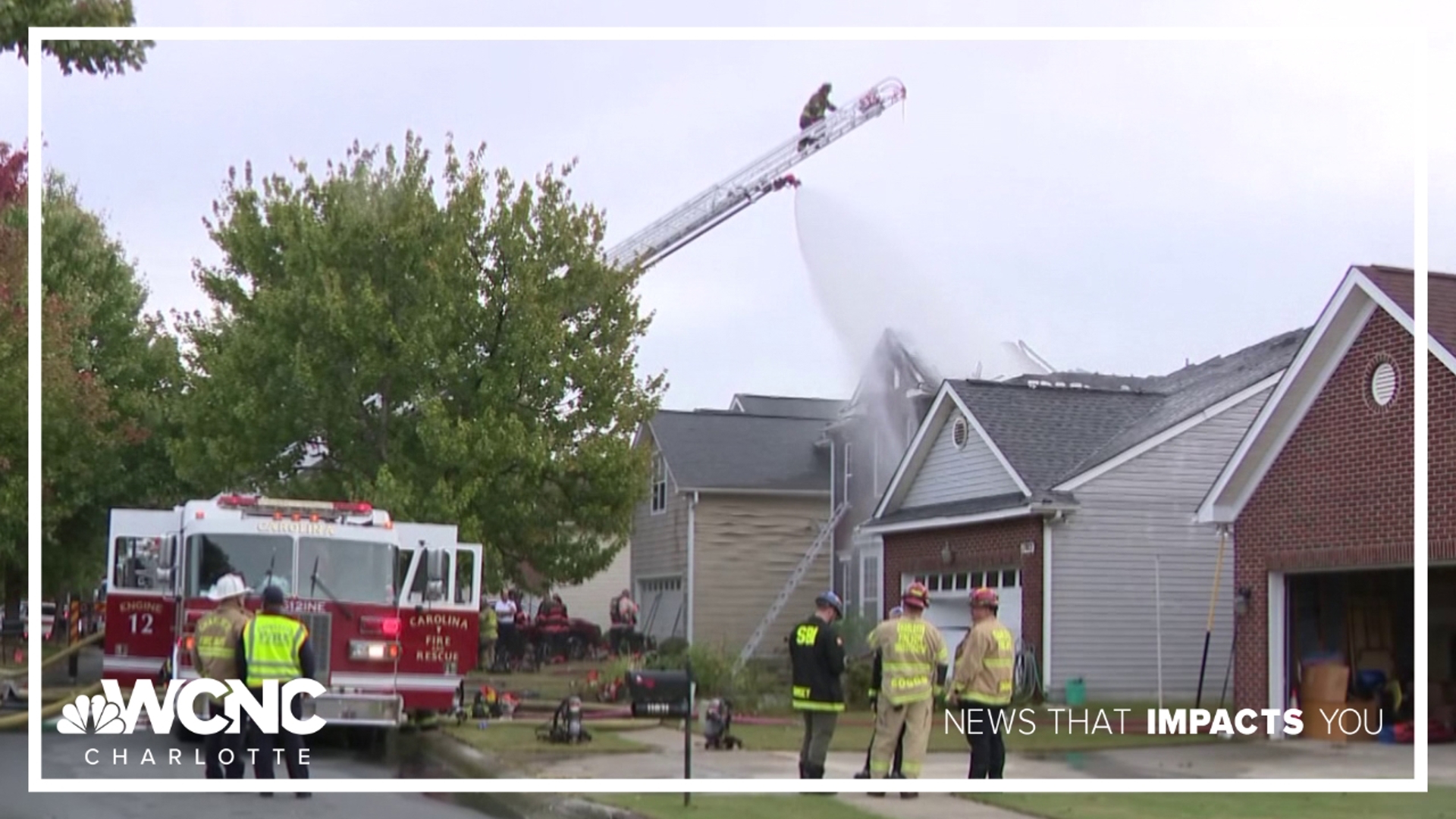 Roof collapses in Charlotte house fire, trapping two firefighters