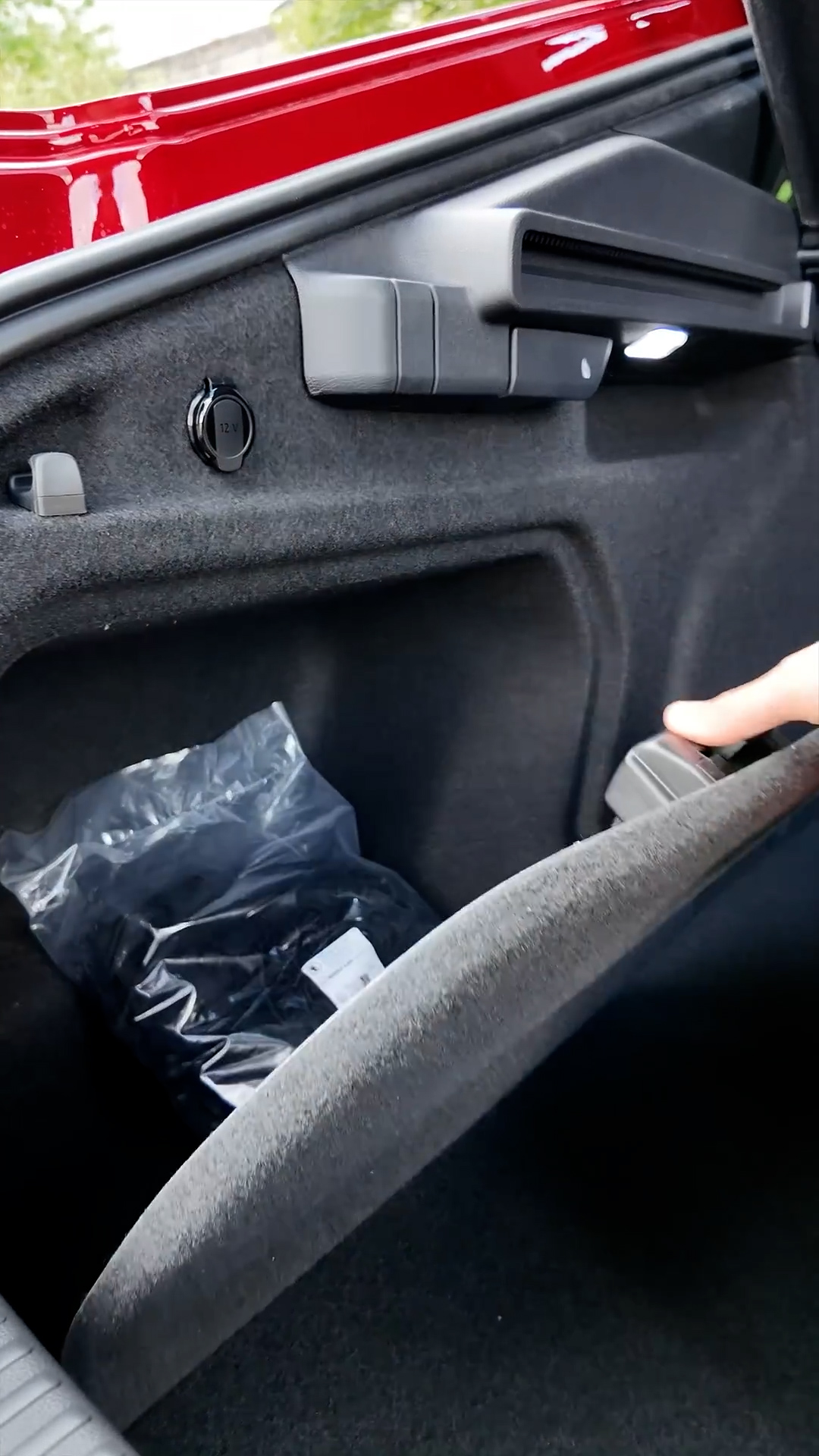 Useful equipment is hidden in the Skoda Superb Sportline cargo area