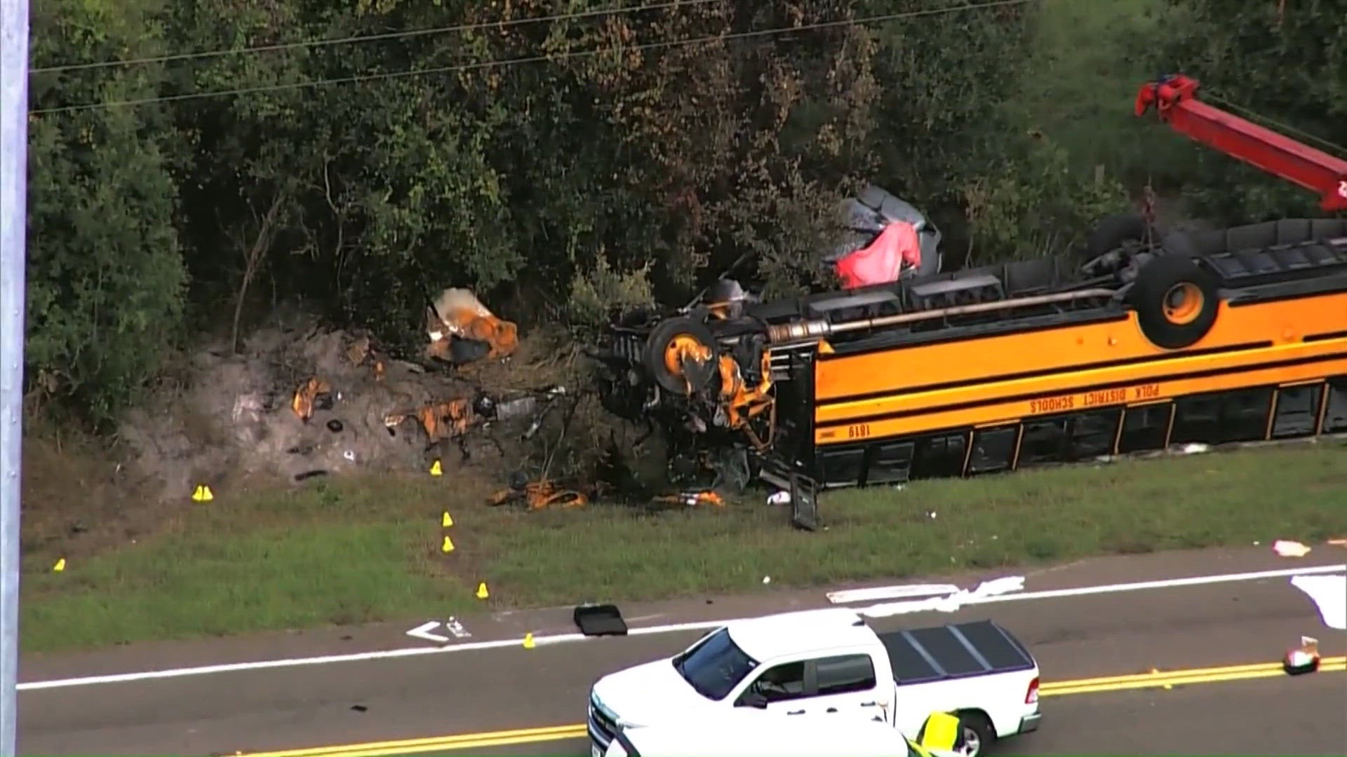 2 people dead after school bus crashes in Florida