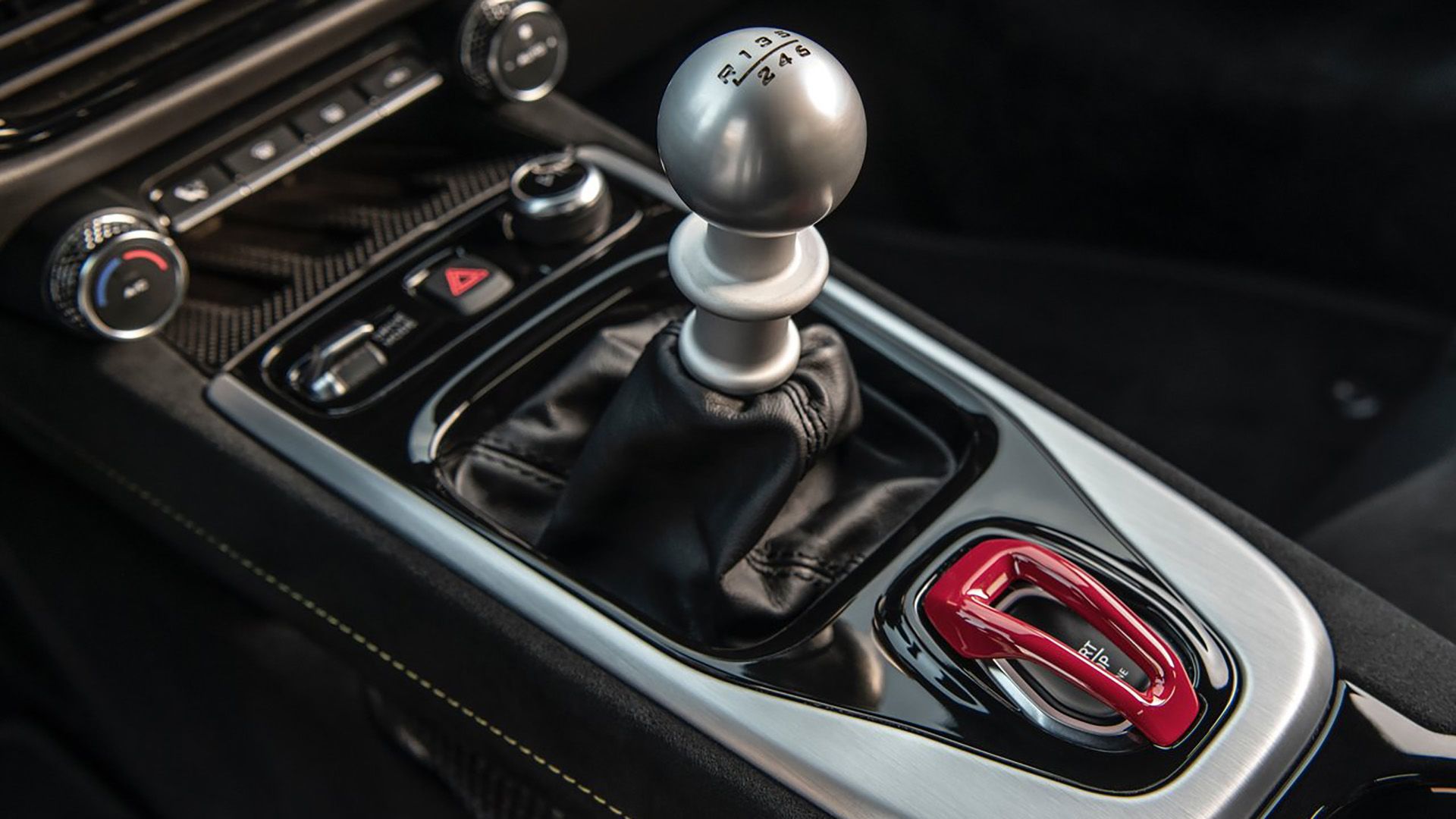 The final mid-engine car with manual under $1 million is a Lotus with a ...