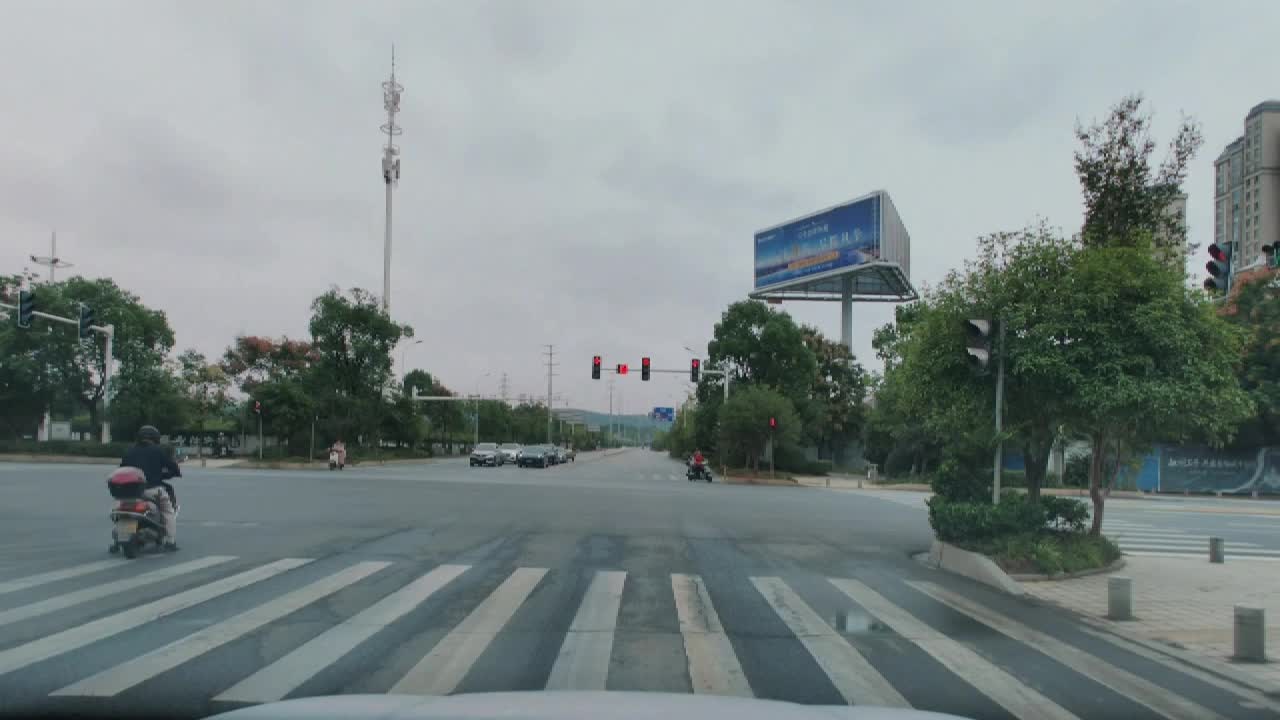 Black car hits two motorcycles and drives away from an intersection in ...