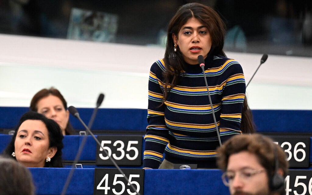 Far-left EU lawmaker under fire after throwing Israeli flag on floor at ...