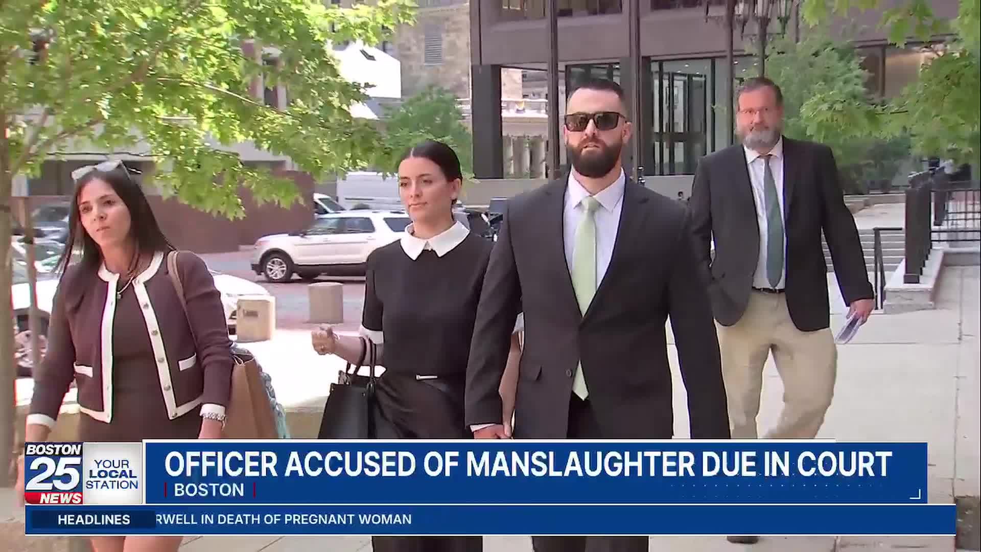 Boston officer charged in deadly shooting of carjacking suspect due ...