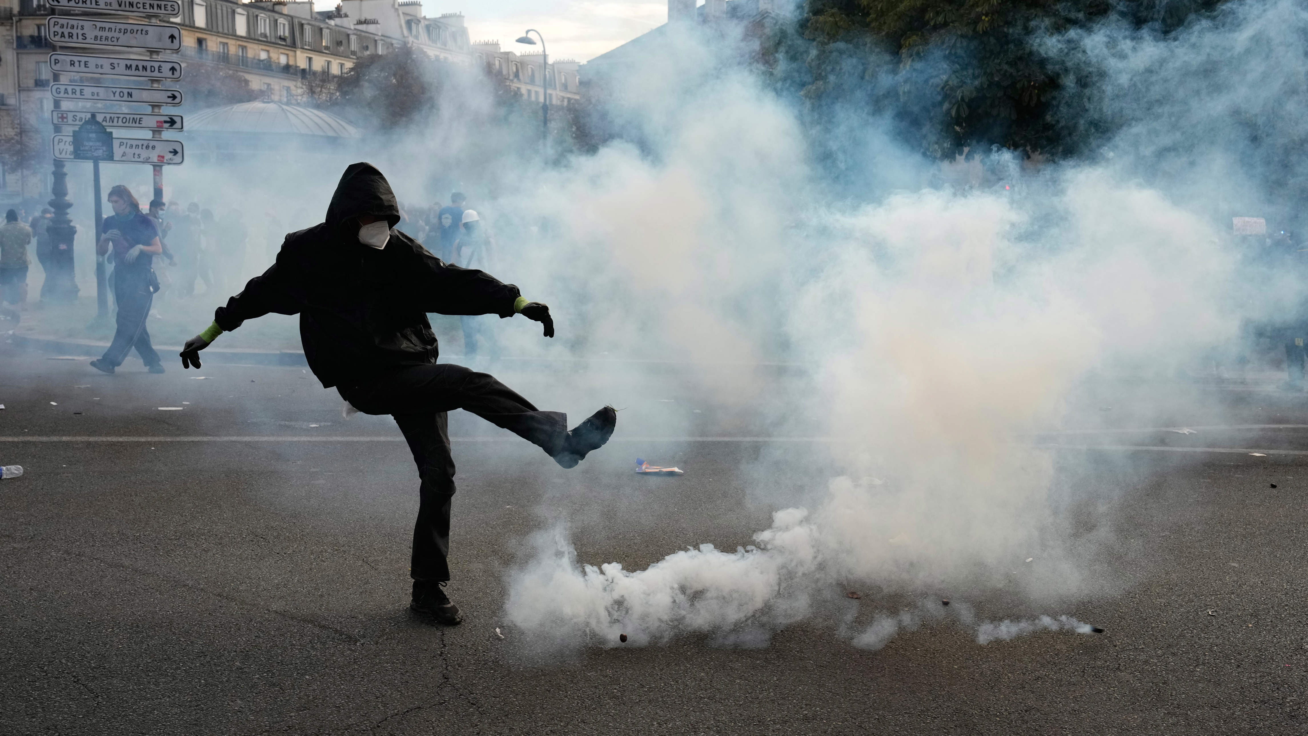 French riot police fire tear gas as more than 250,000 rally for school ...