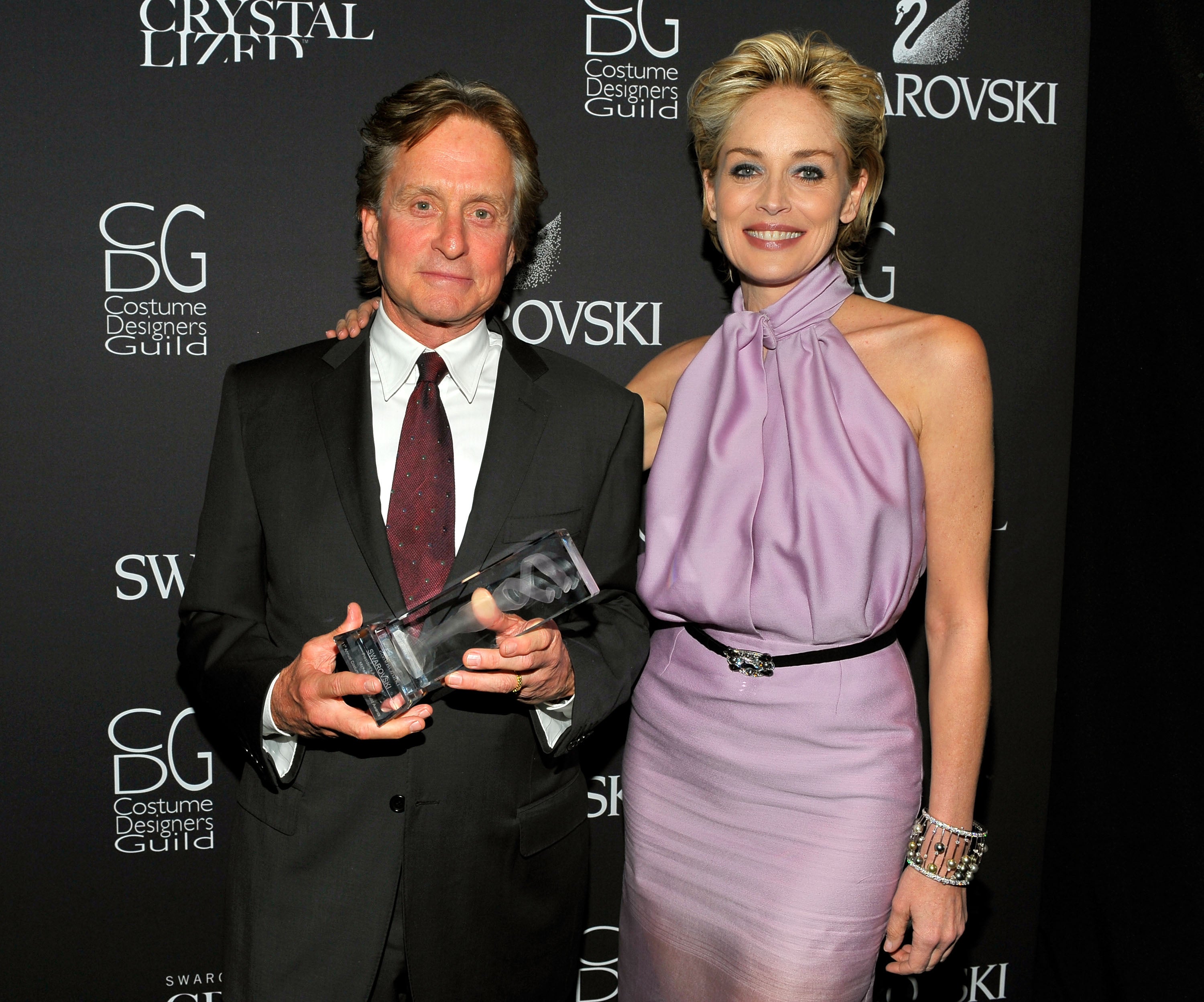 Michael Douglas denies punching director after fight over Sharon Stone