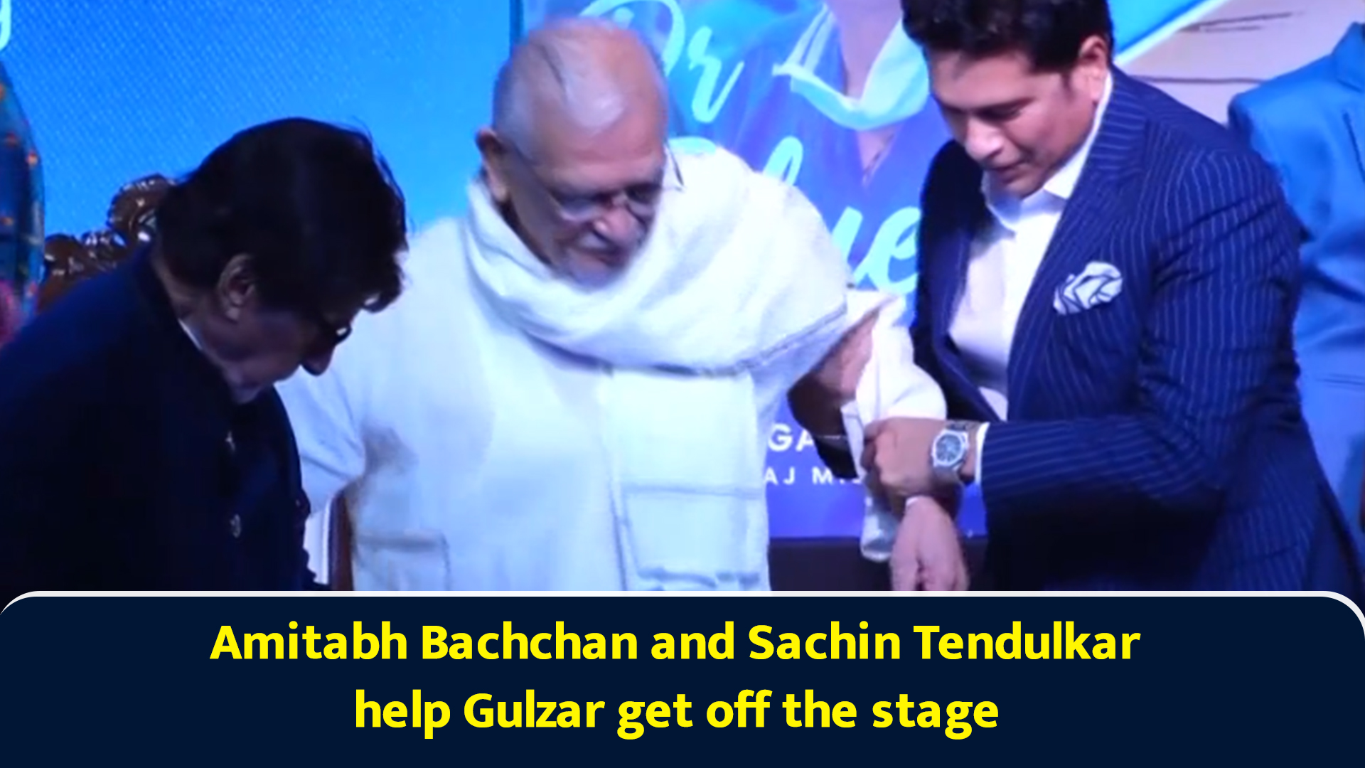 Amitabh Bachchan and Sachin Tendulkar help Gulzar get off the stage
