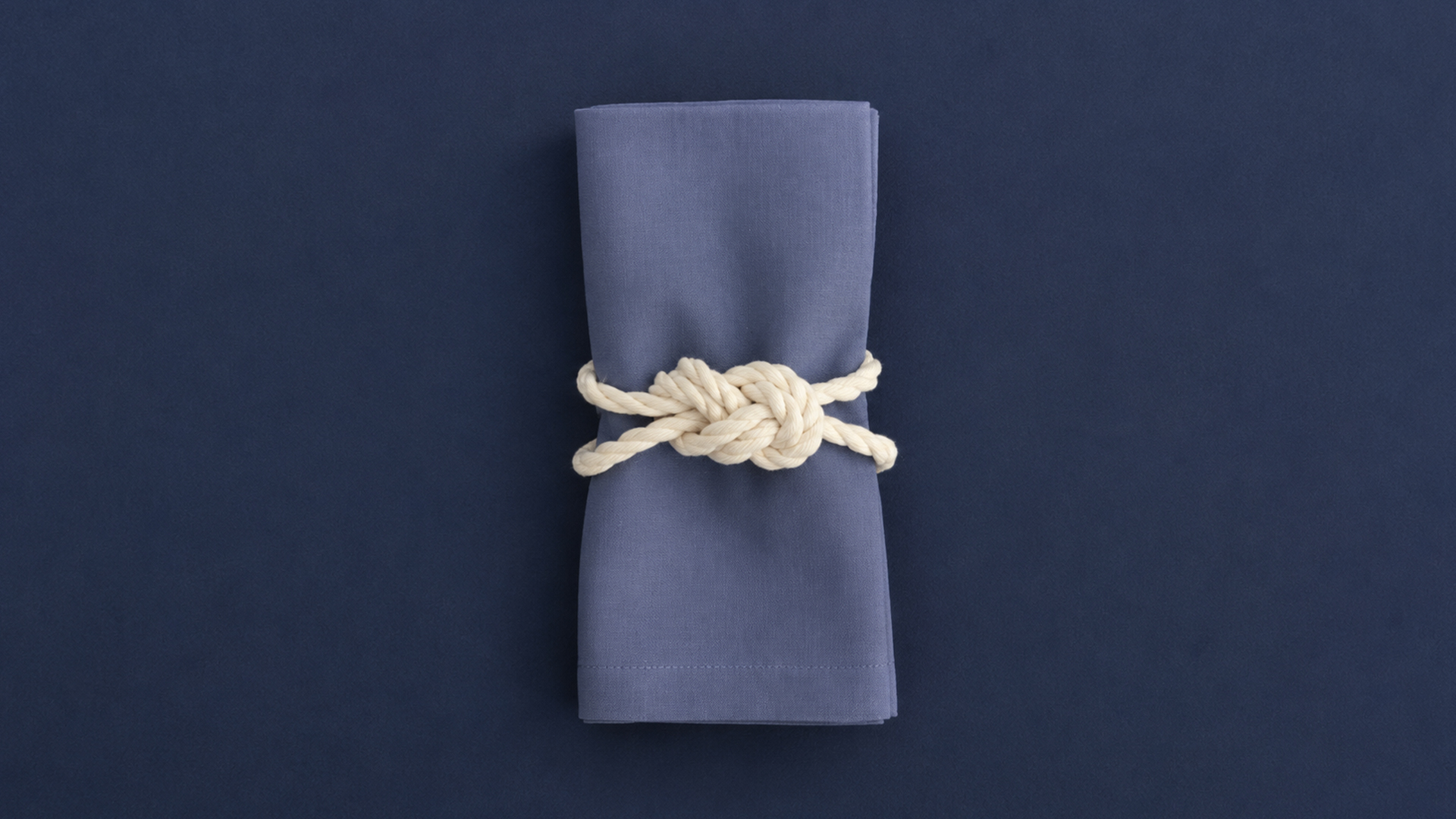 How to tie a classic nautical rope knot for wedding napkins