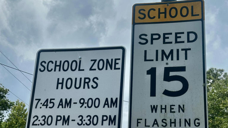 How far apart do speed limit signs need to be on the road?