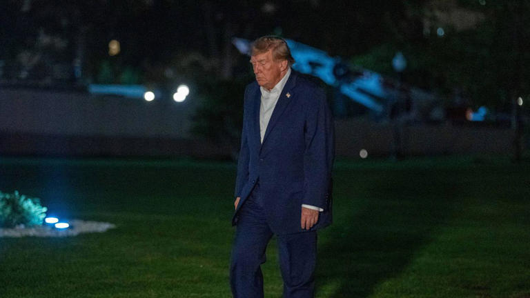 Donald Trump appears to miss his designated exit through stage curtains ...