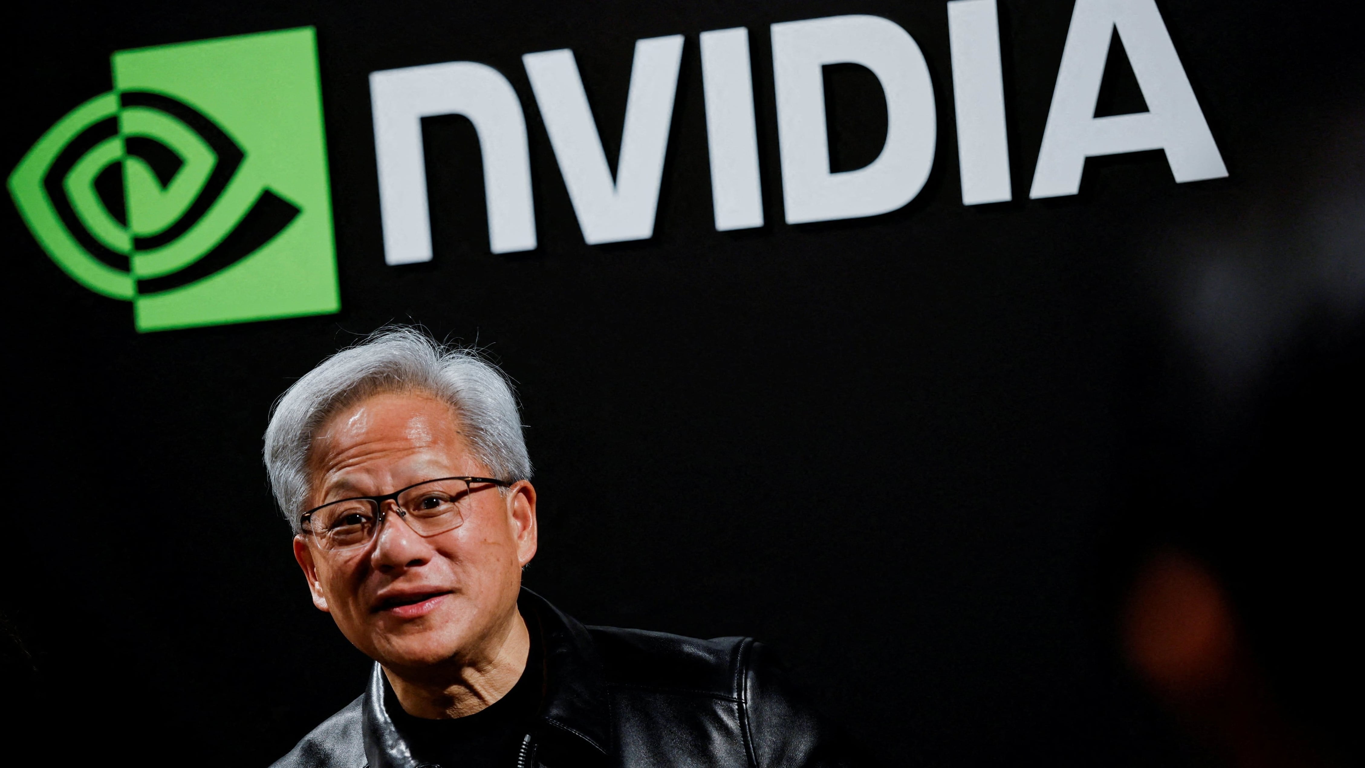 NVIDIA's stock hits new high, nears $6 trillion market cap