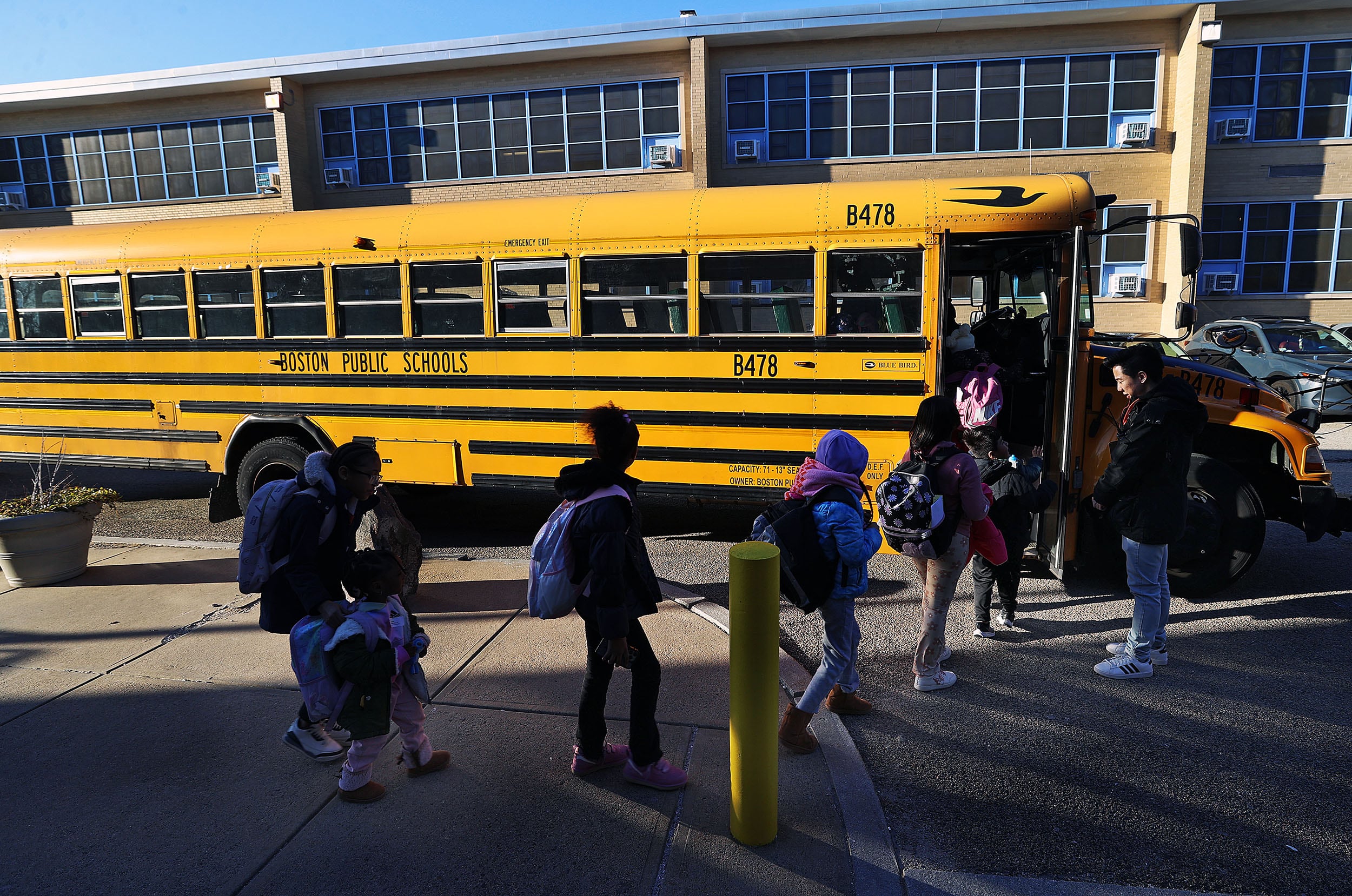 What happened when Boston students were bused to suburban schools?