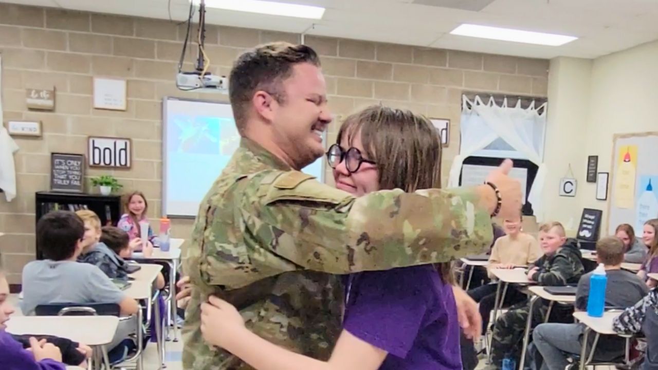 Military dad surprises daughter after fake lost connection on Zoom call ...