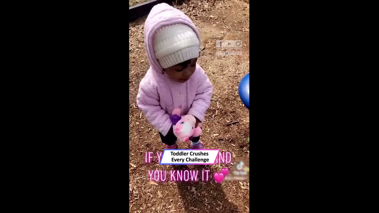 Charming young child engages with actions during 'If you're happy and ...