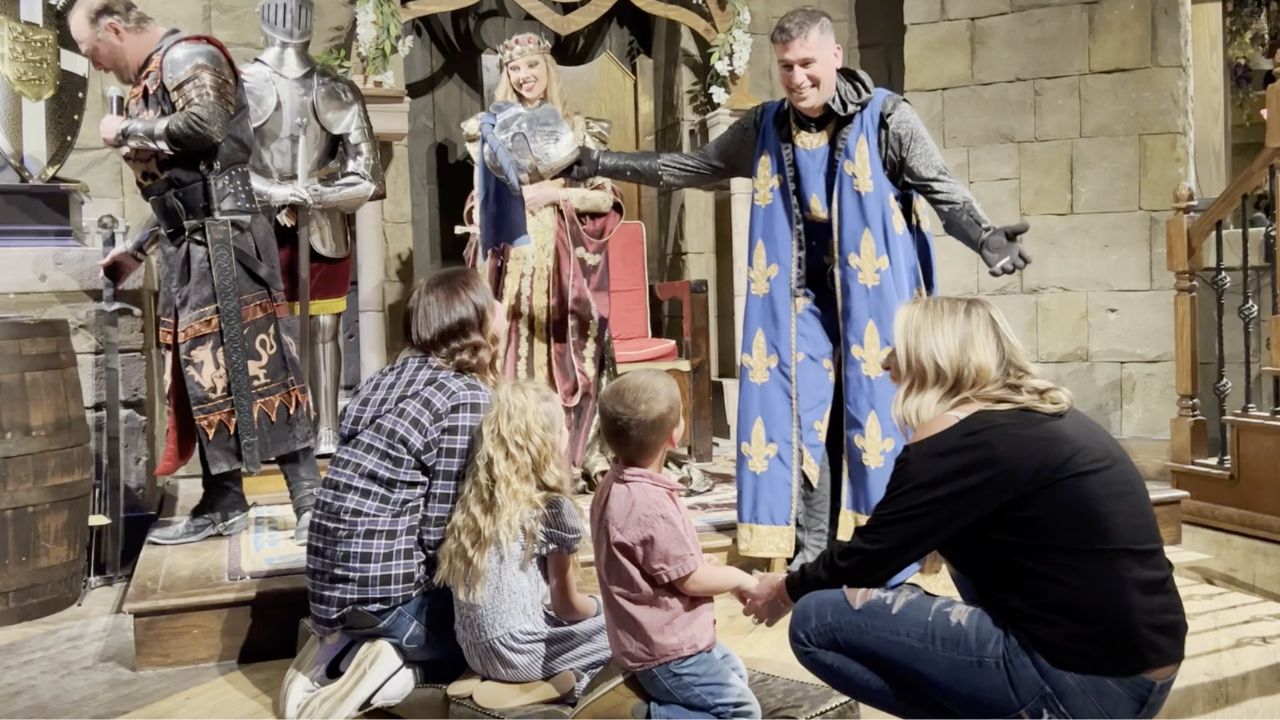 Military dad hides in knight costume to surprise kids at medieval ...