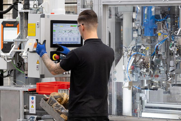 German industrial output rises more than expected in August