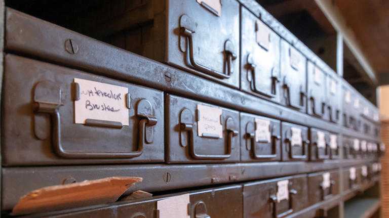 He turns old wood pallets into a rustic, steampunk-inspired storage chest
