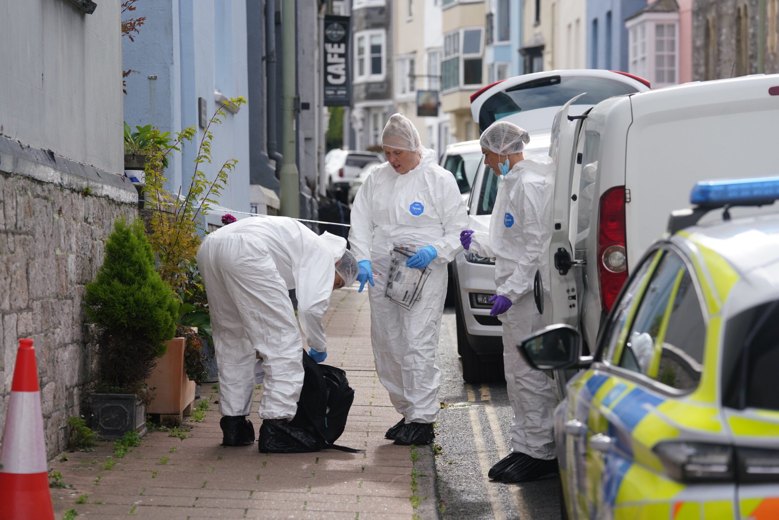 Murder investigation launched after woman in her 40s found dead in property