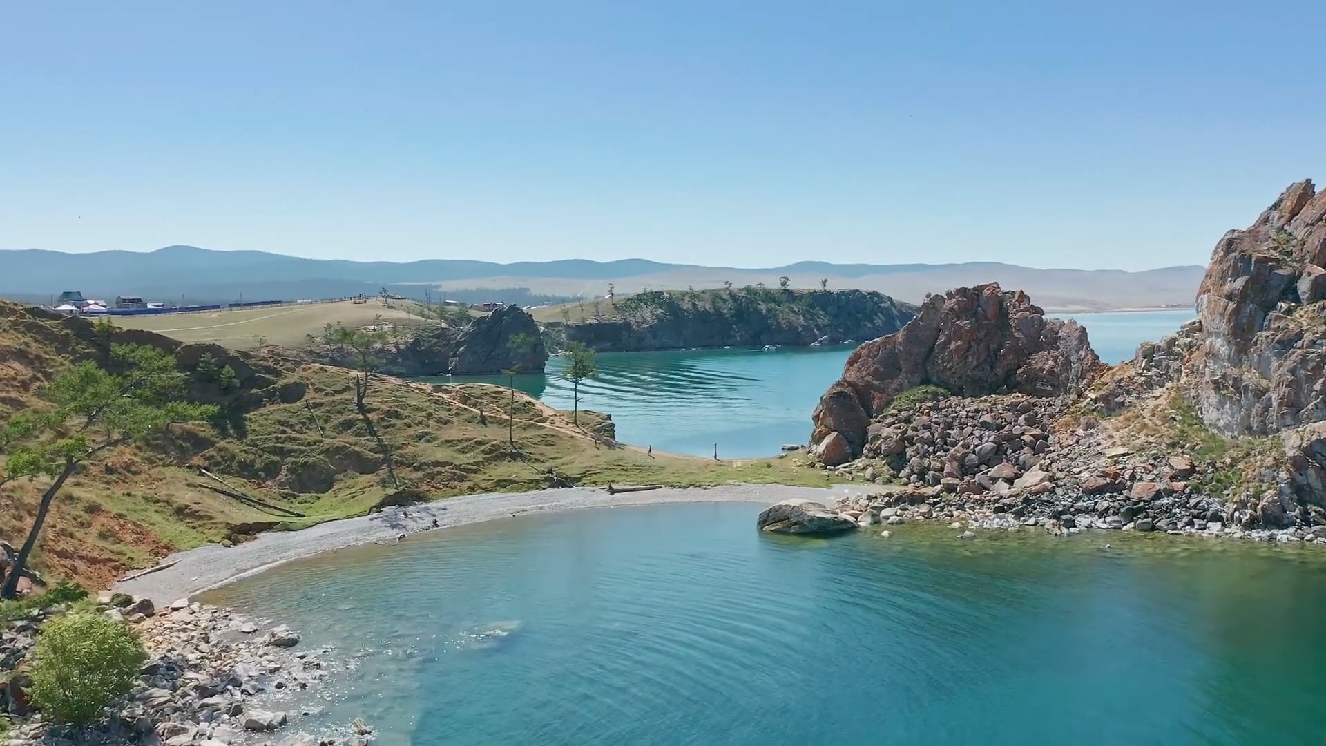 Drone glides over frozen wilderness, Lake Baikal, Russia