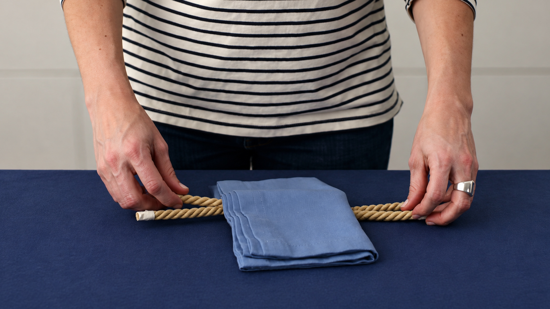 A square knot napkin ring tutorial for a charming seaside table