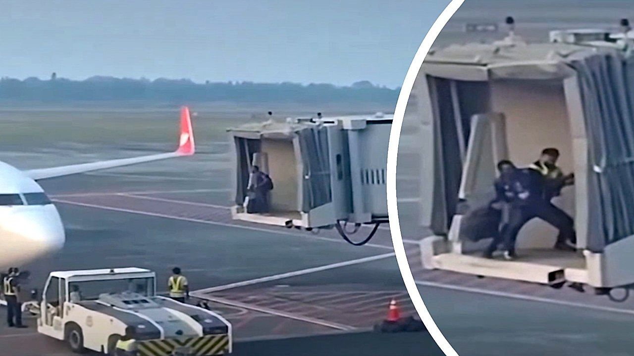 Late passenger for his flight fights with security at the boarding bridge
