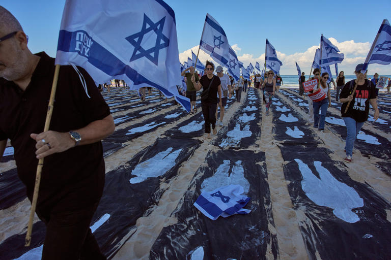 Israelis mourn Oct. 7 attack as Palestinians in Gaza languish in ruins ...