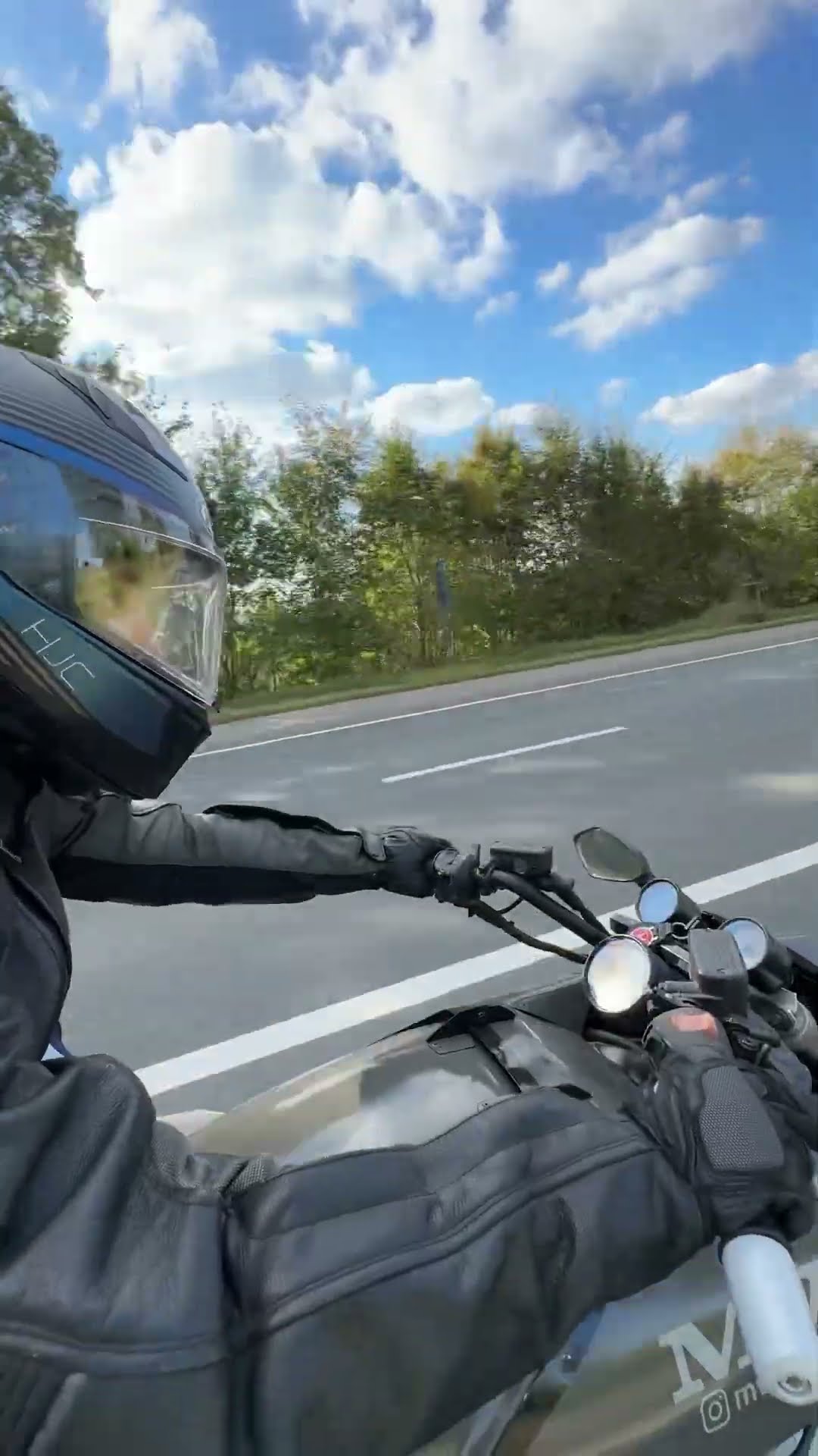 Scenic open road cruising: Unique Honda ST1100 custom streetfighter ride
