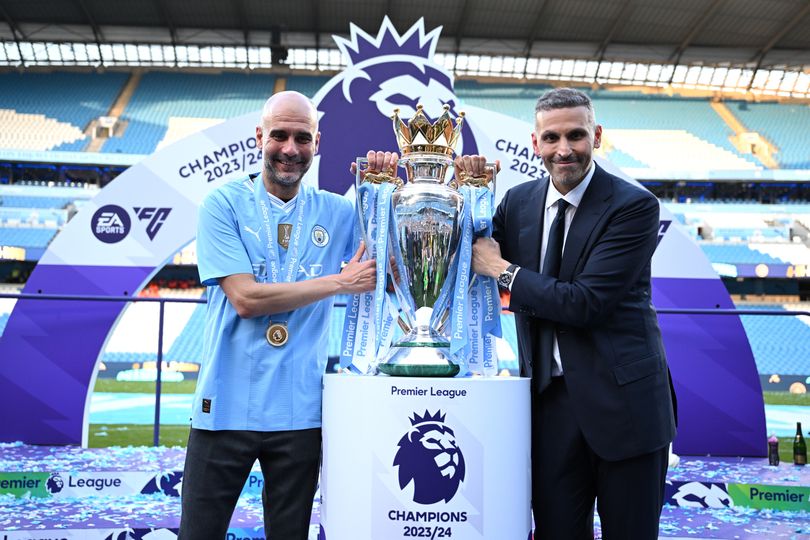 MANCHESTER, ENGLAND - MAY 19: Pep Guardiola, Manager of Manchester City and Khaldoon Al Mubarak, Chairman of Manchester City hold the Premier League title trophy following the team's victory in the Premier League match between Manchester City and West Ham United at Etihad Stadium on May 19, 2024 in Manchester, England. (Photo by Justin Setterfield/Getty Images)
