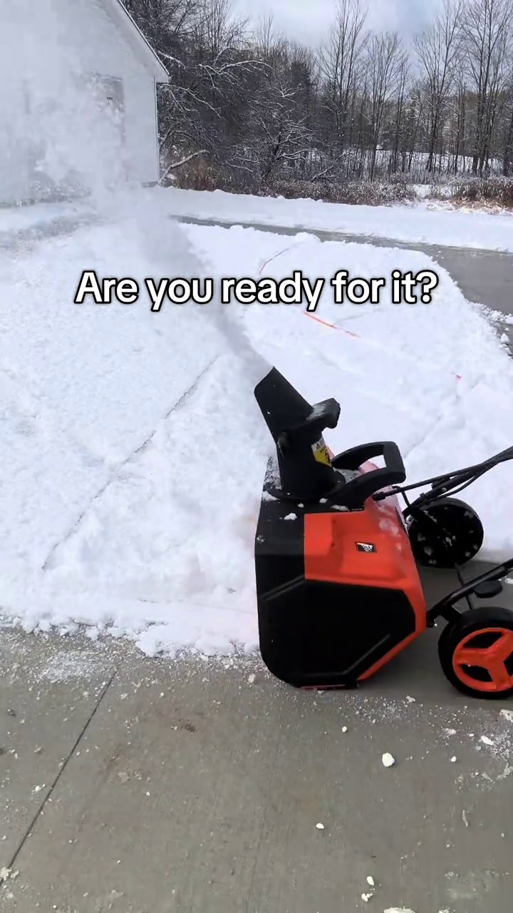 Watch this compact snow blower clear a driveway fast