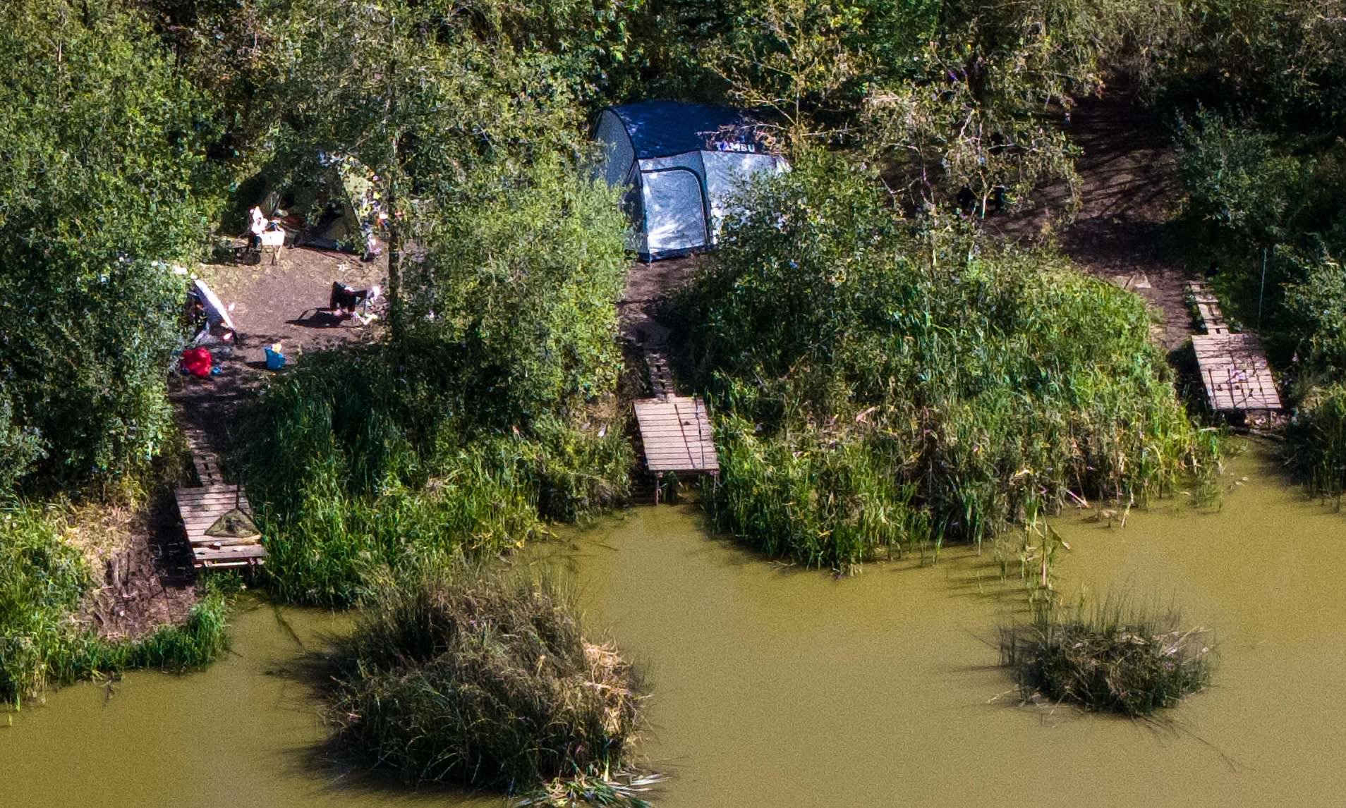 Death of baby found in tent 'is unexplained', inquest hears - as four ...