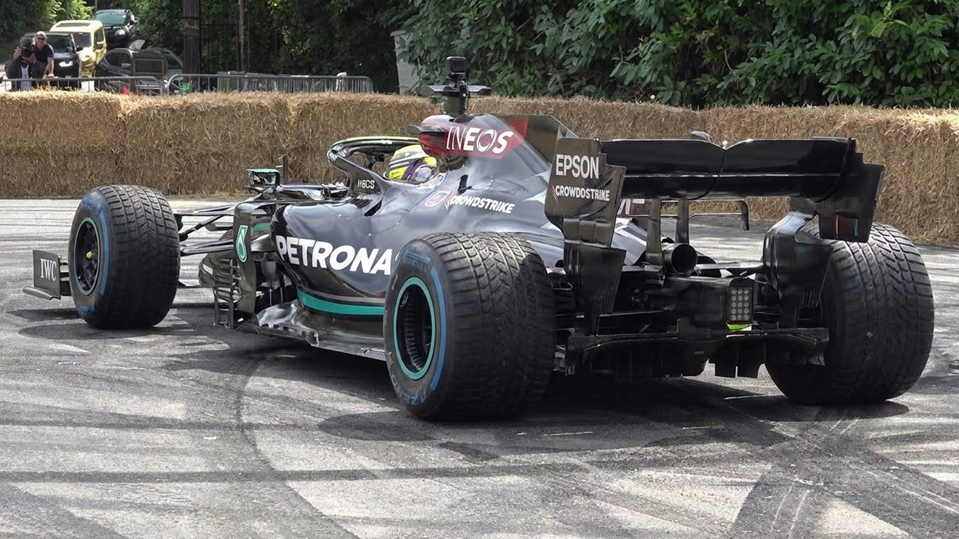 Mercedes AMG F1 W12 spins its rear tires at Goodwood