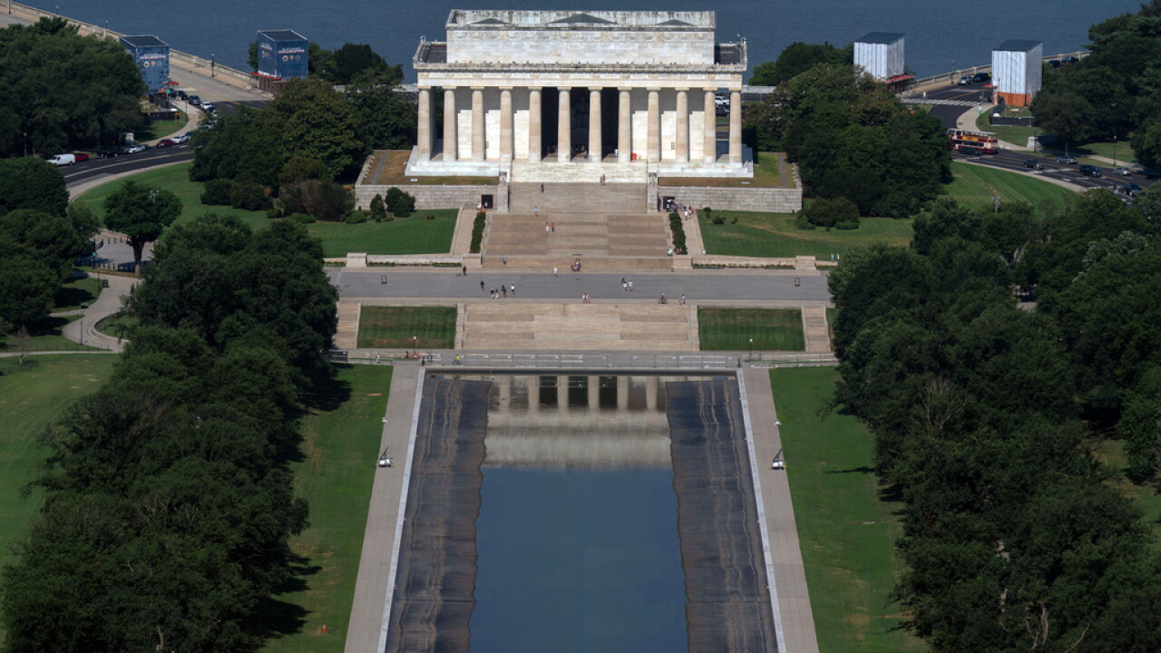 Reflecting Pool repairs near completion after dispute over cause of delays