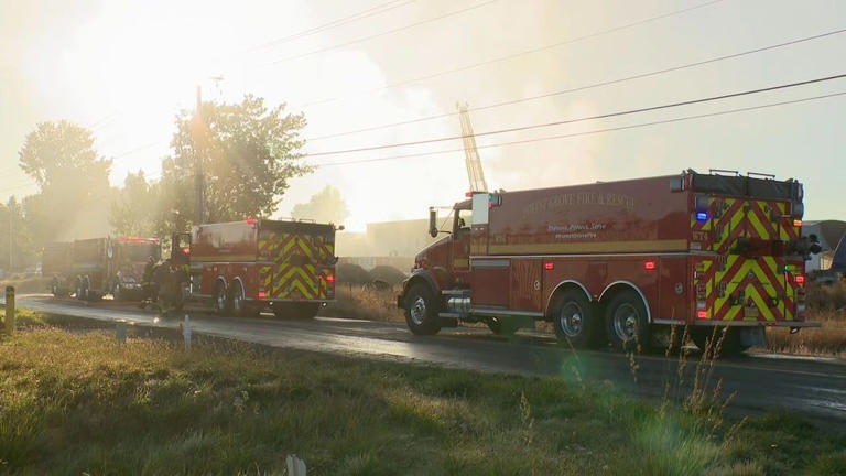 Firefighters battle 2-alarm fire at building south of Cornelius