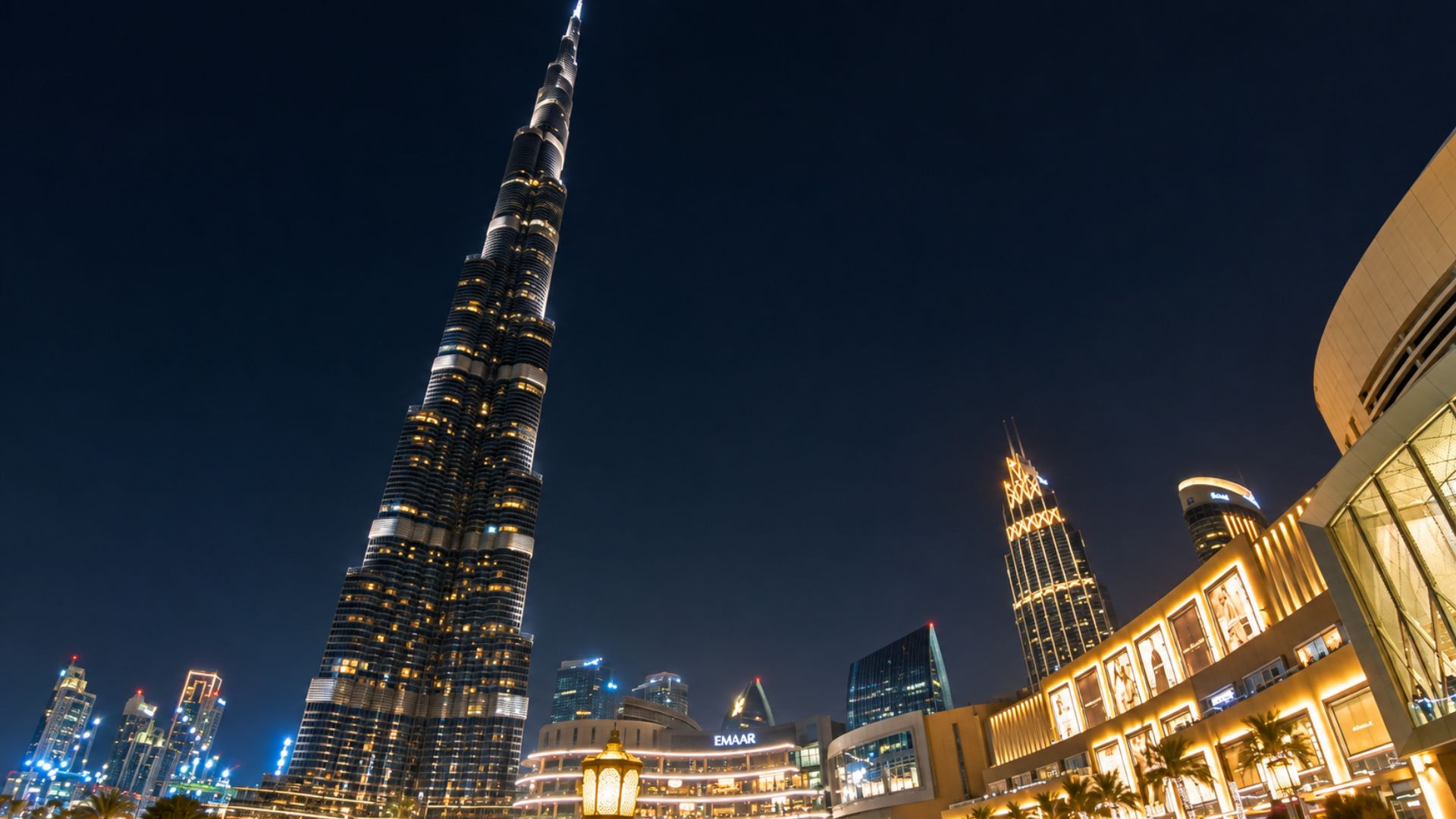 Walking beneath the Burj Khalifa at Dubai Mall after dark (4K)