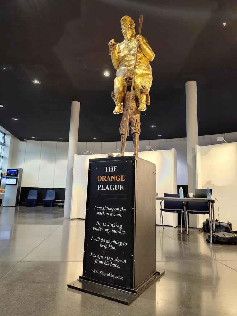 Nude gold statue of Trump 'Orange Plague' unveiled