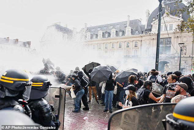 Officers were seen using water cannons in the city to try and contain protests