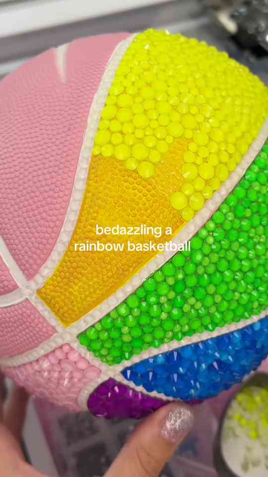 Rainbow rhinestones give a basketball a colorful makeover