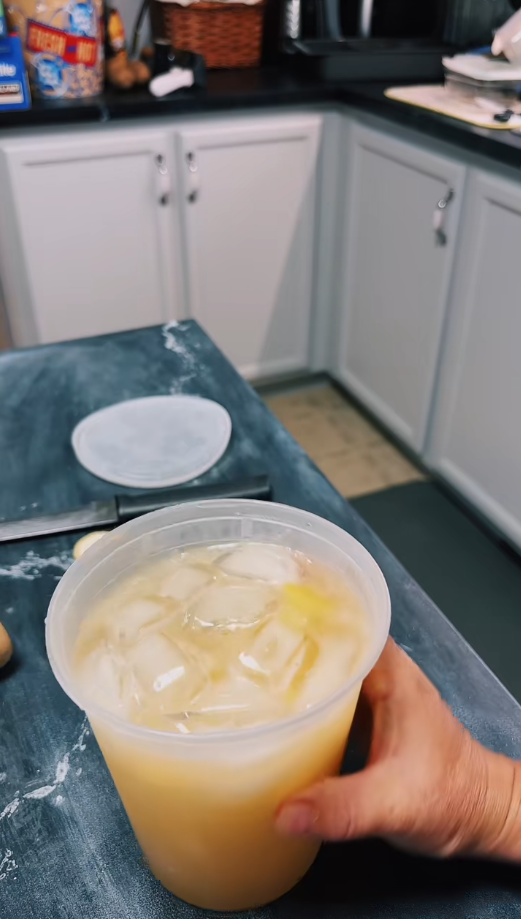 Making rhubarb lemonade with fresh fruit syrup