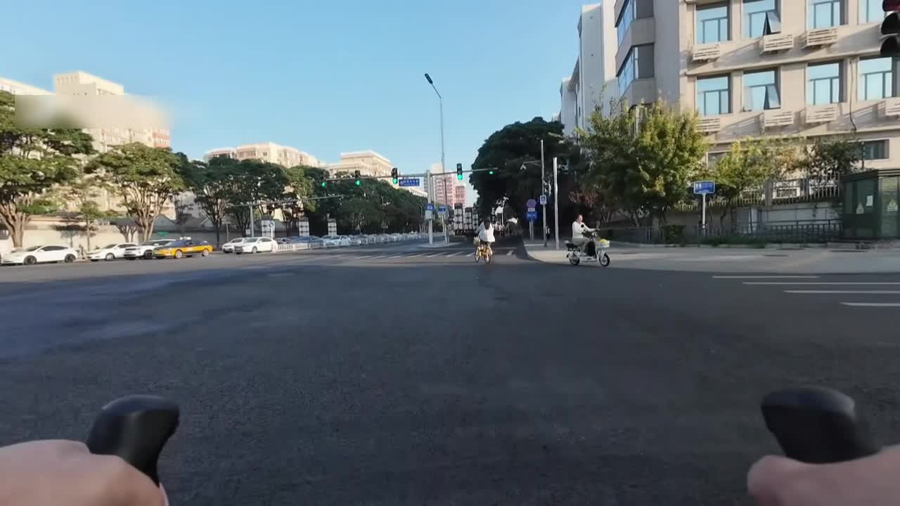 Motorcycle crashes into a cyclist after a sudden turn at an ...