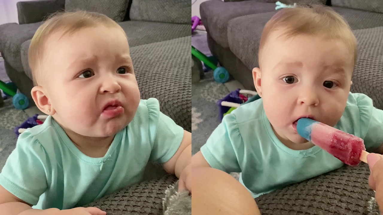 7-month-old baby experiments with lemon popsicle for the first time