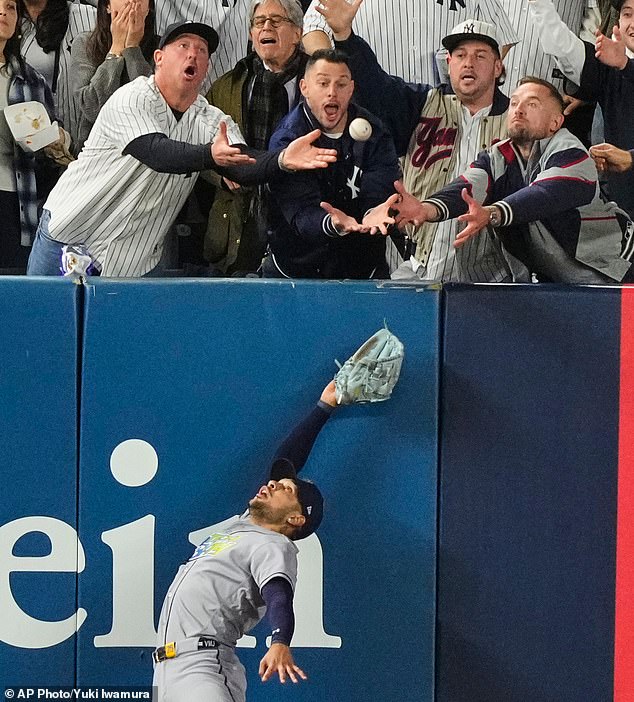 Yankees' do-or-die game 3 descends into controversy as overzealous fan ...