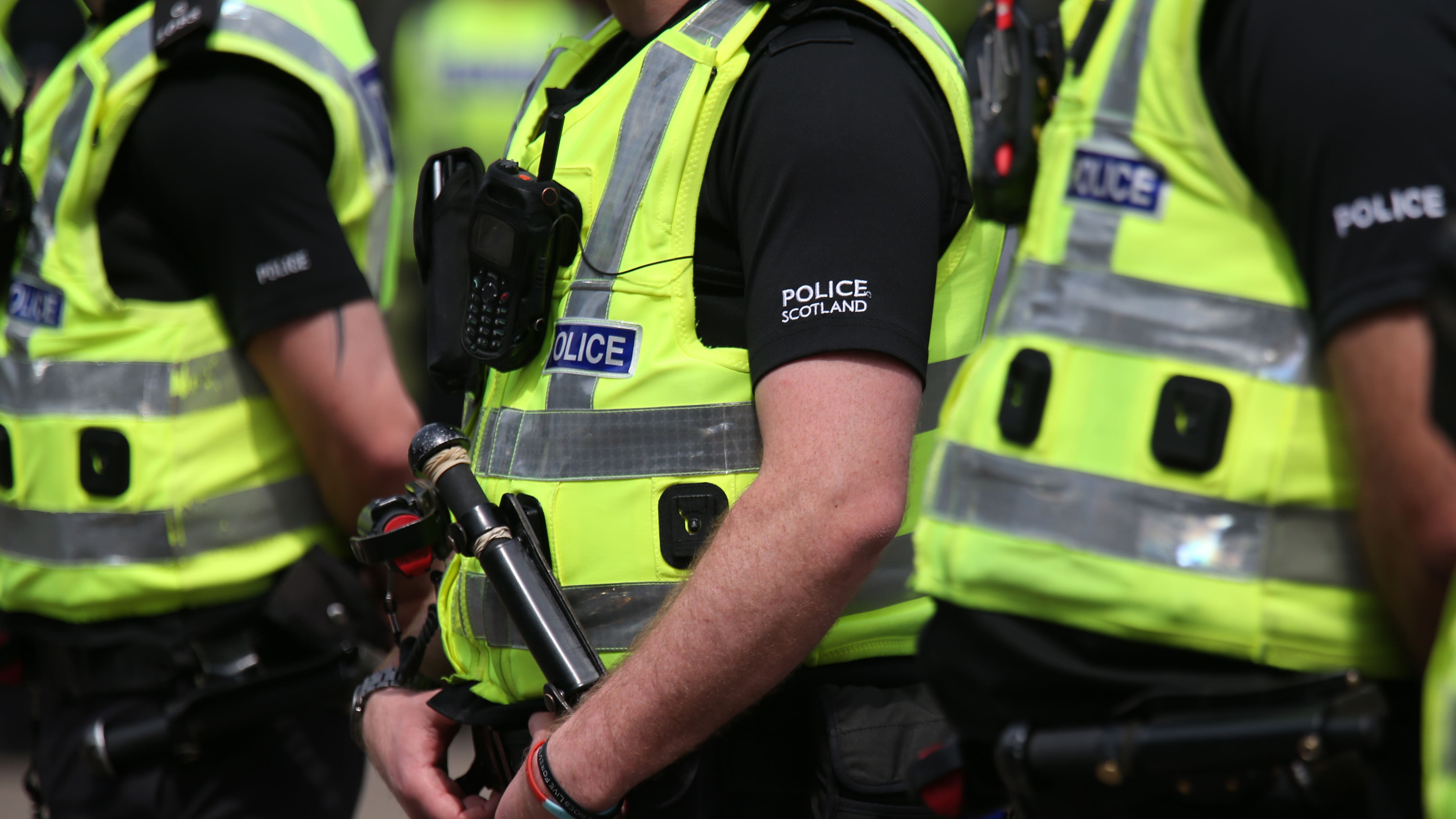Man arrested after anti-immigration protest involving masked group in ...