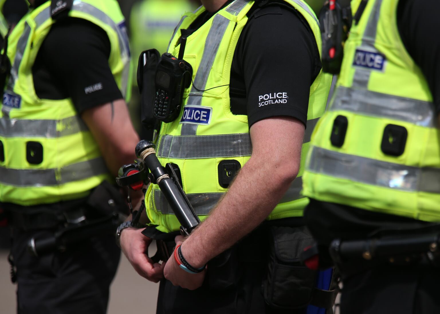 Man arrested after anti-immigration protest involving masked group in ...