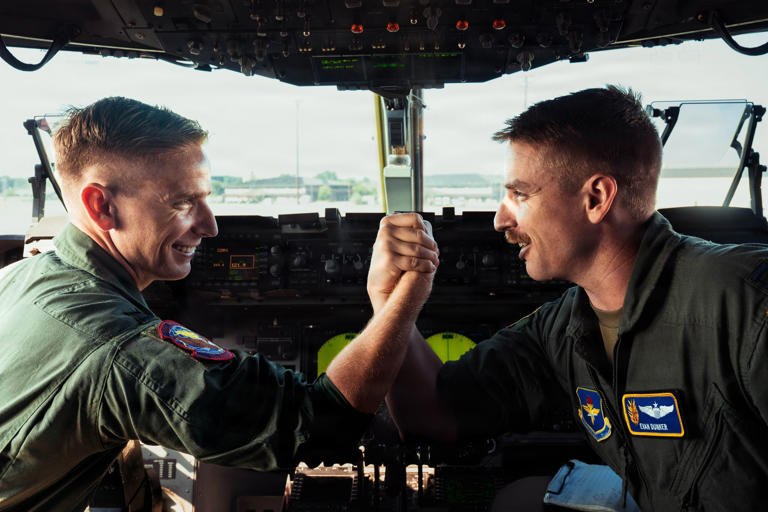 Twin Air Force pilots fly C-17 together over Clemson football game