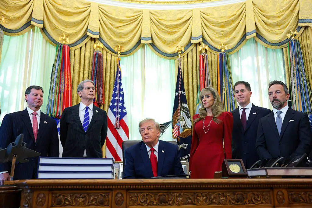 ‘Woman in the red dress’ behind Trump goes viral after bizarre ‘robot ...