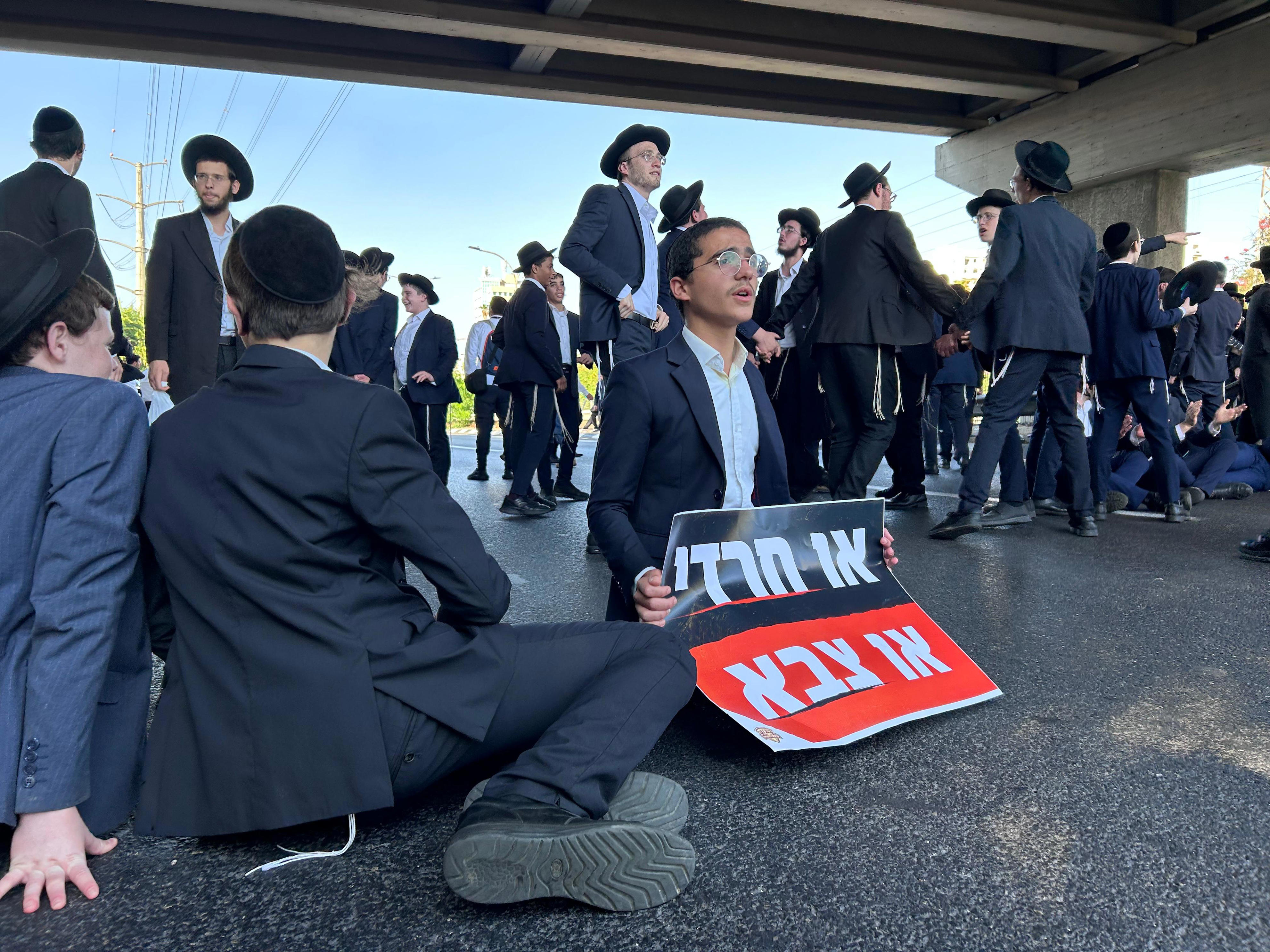 Haredi demonstrator dragged by vehicle as mass anti-draft protests ...