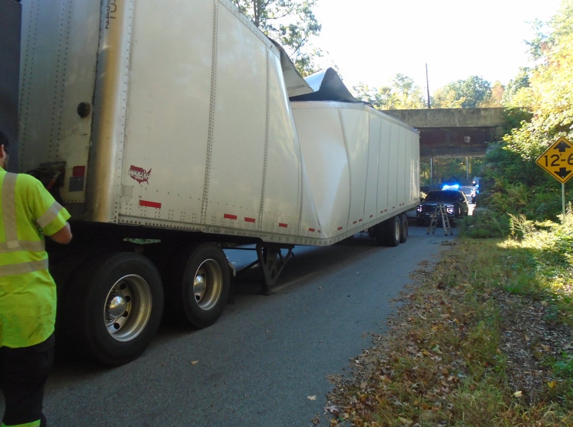 Driver from Utah scrunches his truck on MBTA bridge, blames GPS